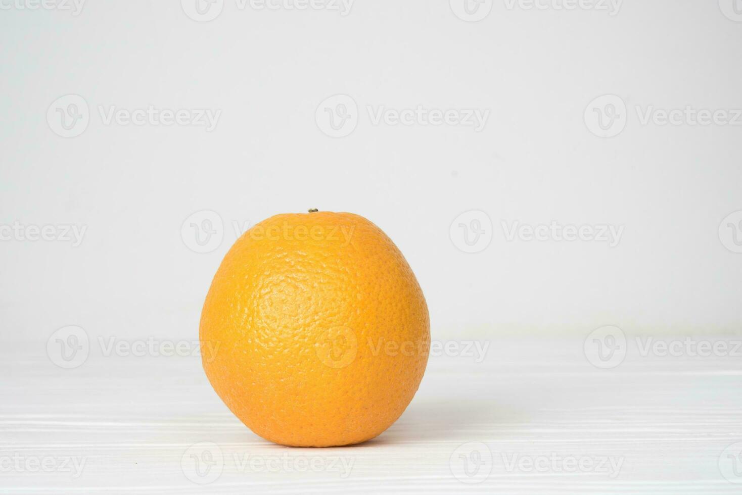 Orange on white background photo