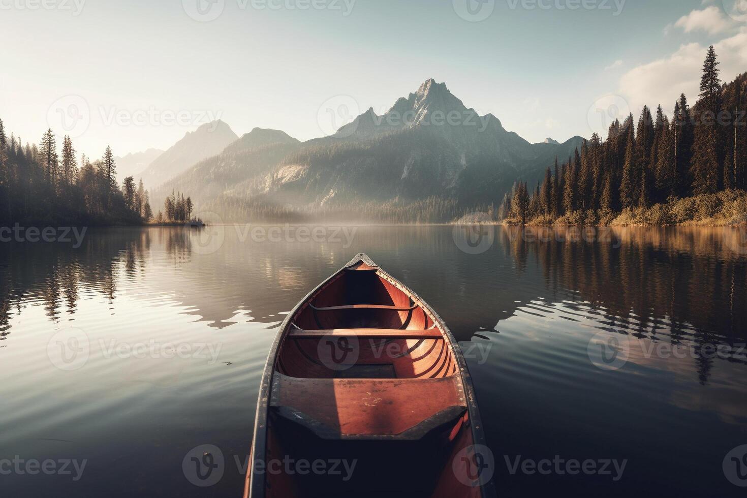 Canoe floating on a serene mountain lake surrounded by tall pine trees on a peaceful morning. photo