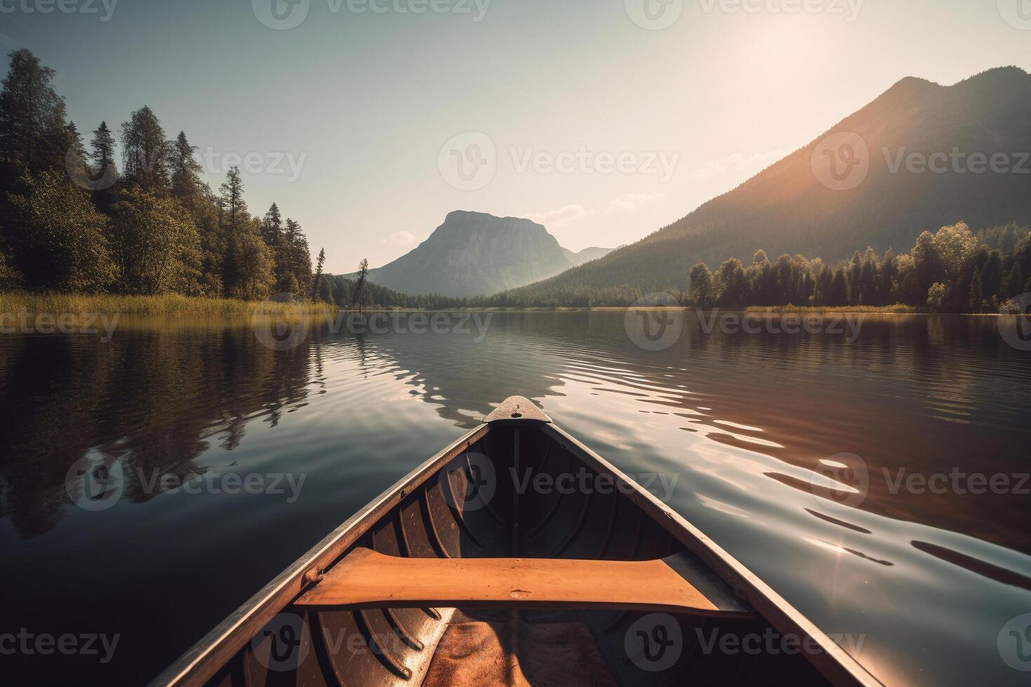 Canoe floating on a serene mountain lake surrounded by tall pine trees on a peaceful morning. photo