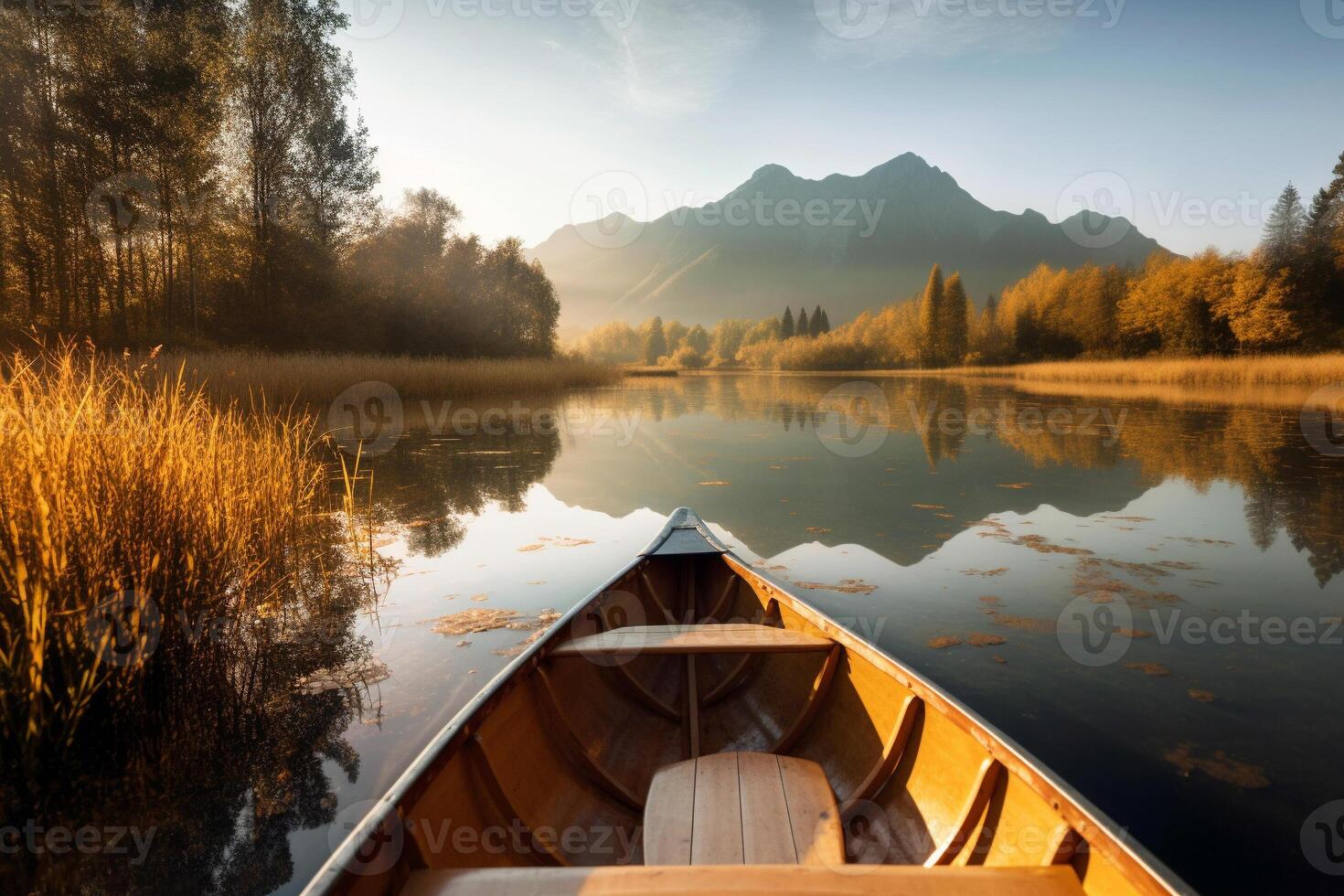 Canoe floating on a serene mountain lake surrounded by tall pine trees on a peaceful morning. photo