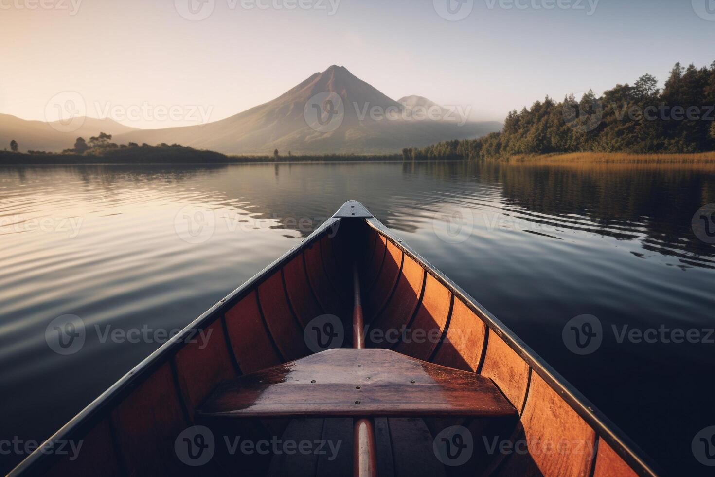 Canoe floating on a serene mountain lake surrounded by tall pine trees on a peaceful morning. photo