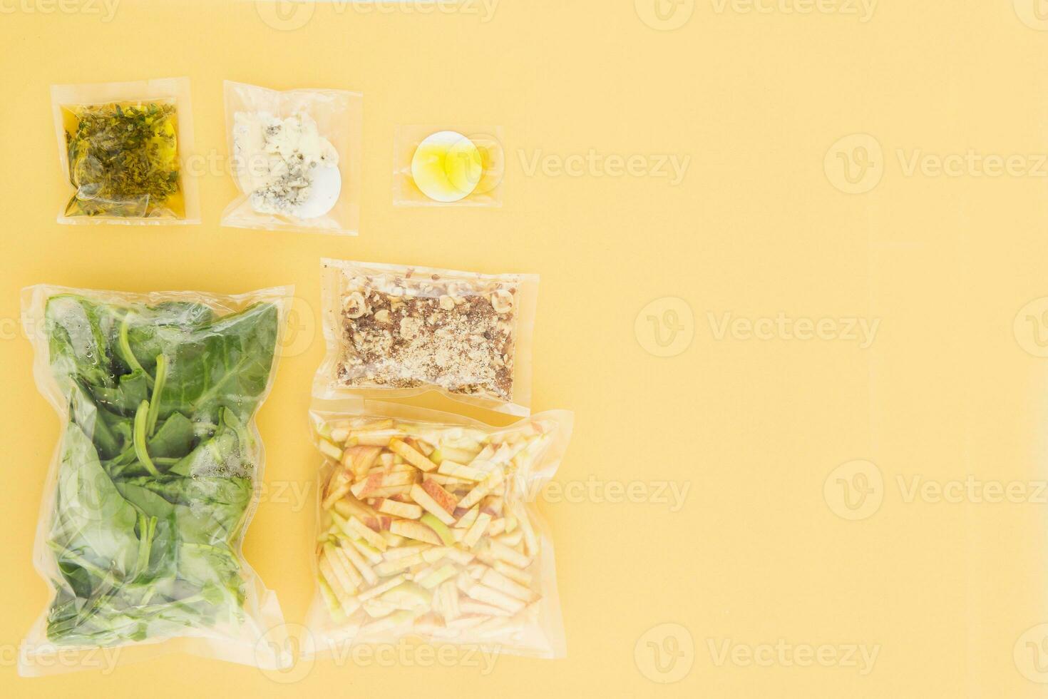 Set of products for salad preparation Set for delivering food for dinner. Cooking at home, home cooking. Flat lay. Products in vacuum packaging. photo