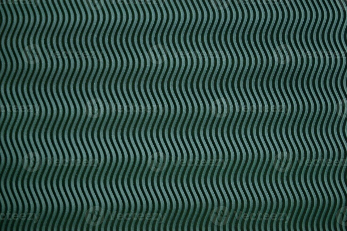 Green background with wavy texture. Perfect background for your design photo