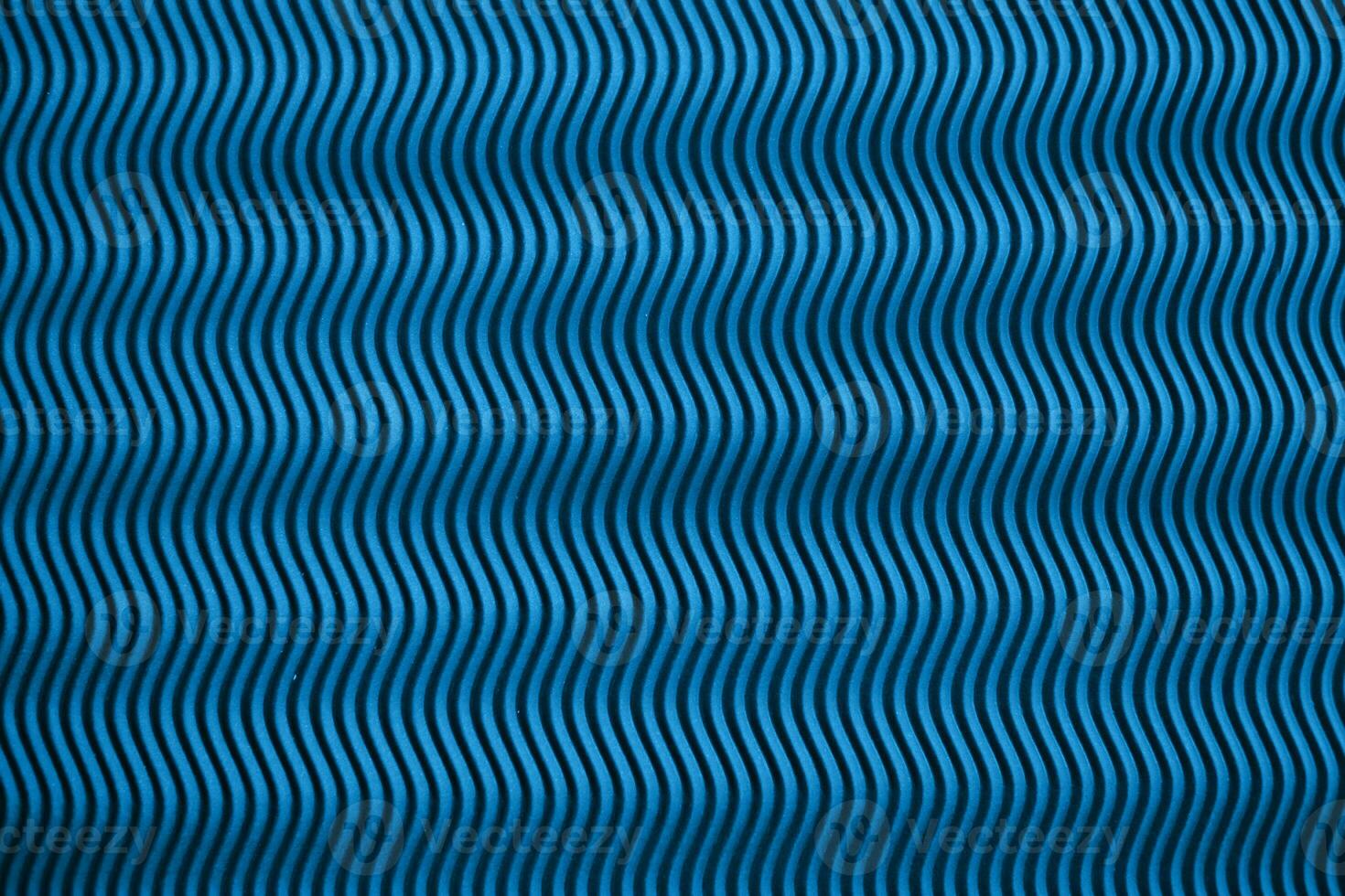 Blue background with wavy texture. Perfect background for your design photo