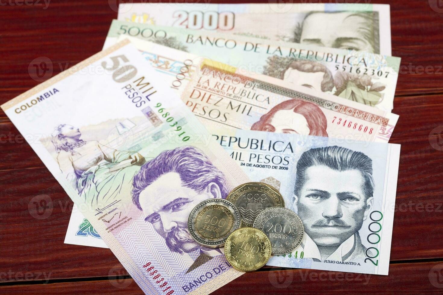 Colombian  Pesos coins and banknotes photo