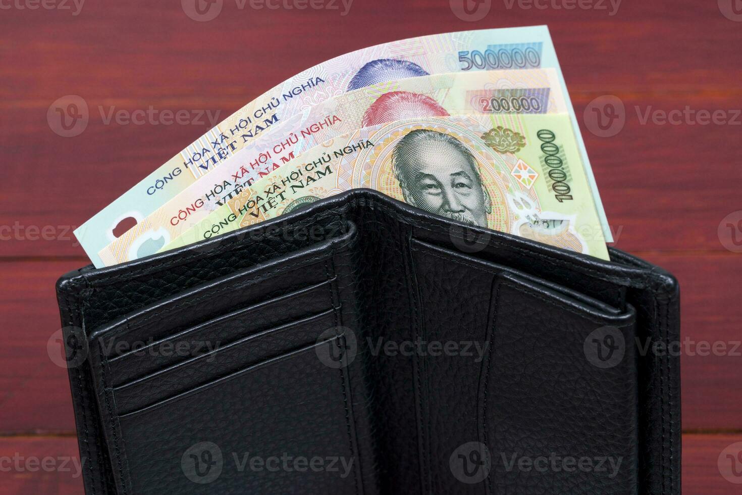 Vietnamese money - dong in the black wallet photo