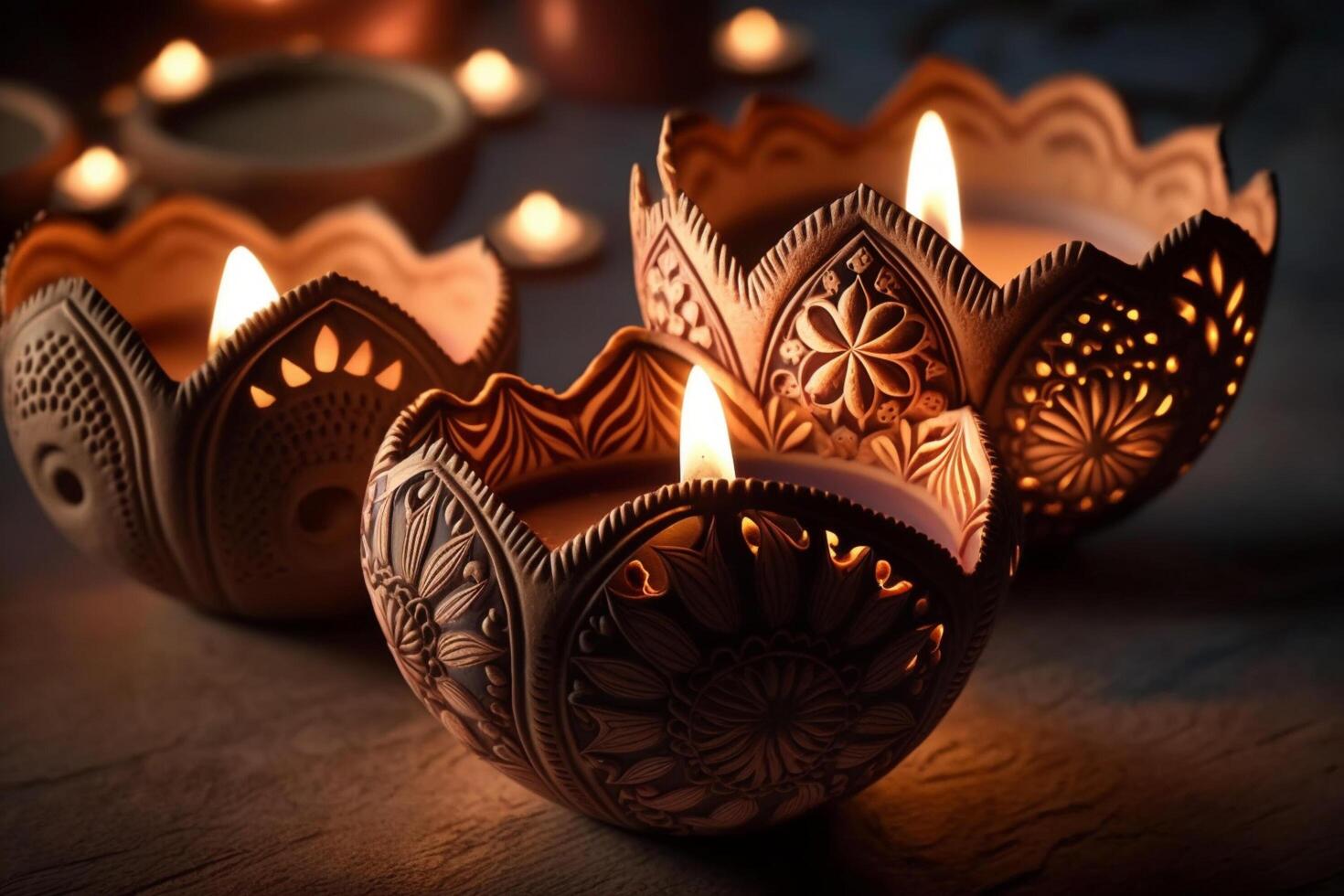 Happy diwali or deepavali traditional indian festival with clay diya oil lamp. Indian hindu festival of light symbol with candle and light. Clay diya lamp lit during diwali celebration by photo
