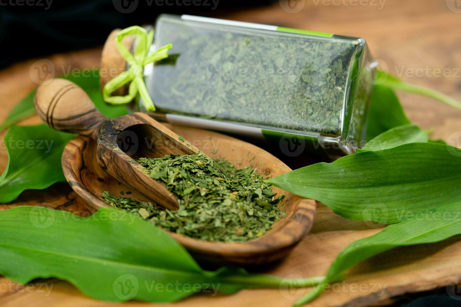 wild garlic on olive wood photo