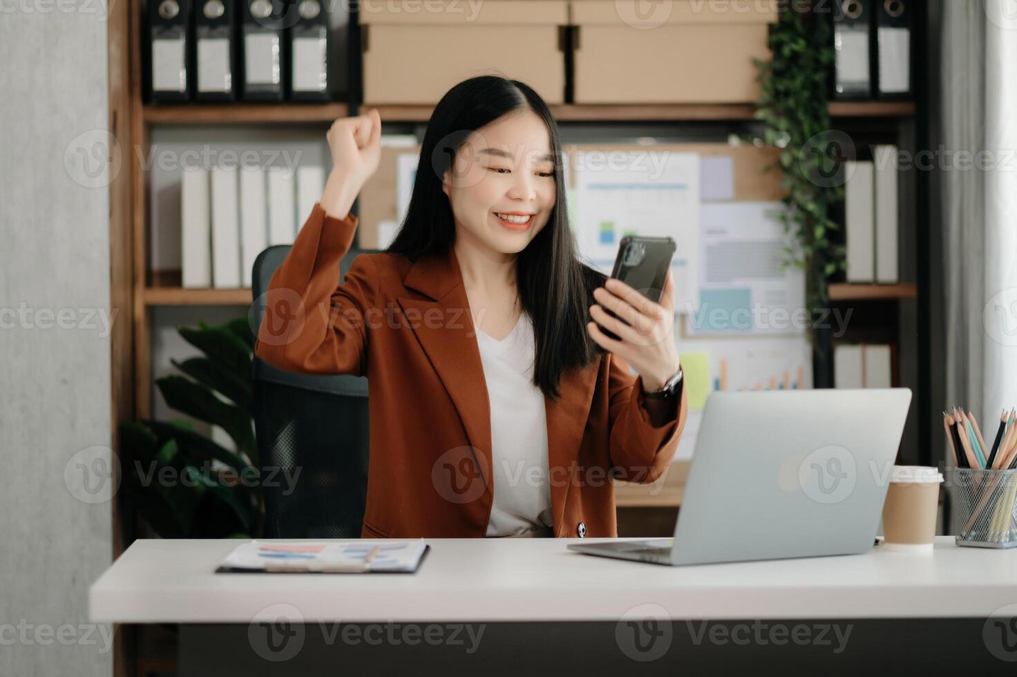Business woman using tablet and laptop for doing math finance on an office desk, tax, report, accounting, statistics, and analytical research concept photo