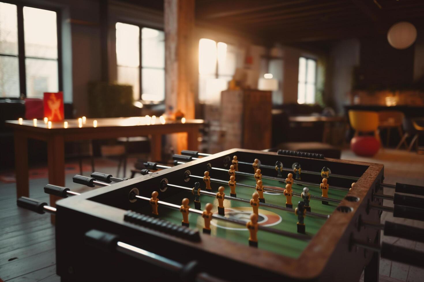 Fun and Games Leisure Area in a Hostel with Foosball and Bright Spaces photo