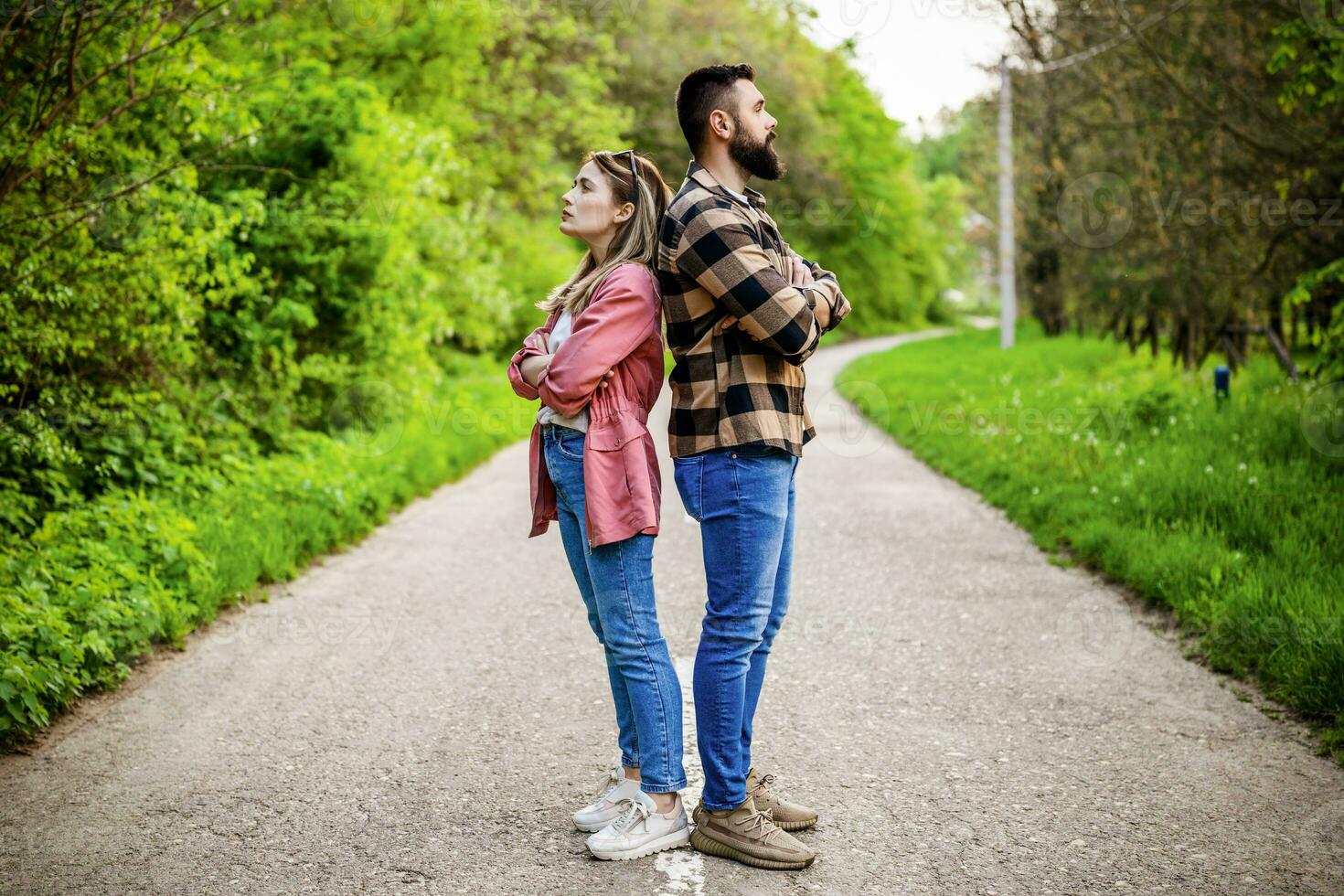 Couple is having difficulties in their relationship. They are both offended and angry. Conceptual image. photo