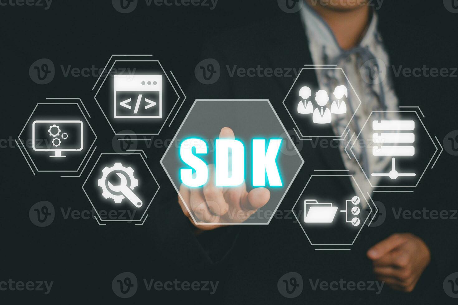 SDK - Software development kit programming language technology concept, Business woman hand touching SDK icon on virtual screen. photo