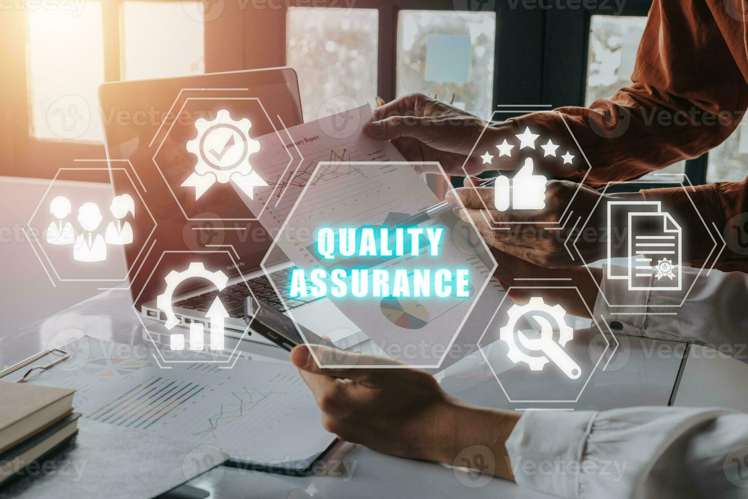 Quality Assurance concept, Business team working on laptop computer and analyzing finance data on office desk with Quality Assurance icon on virtual screen. photo