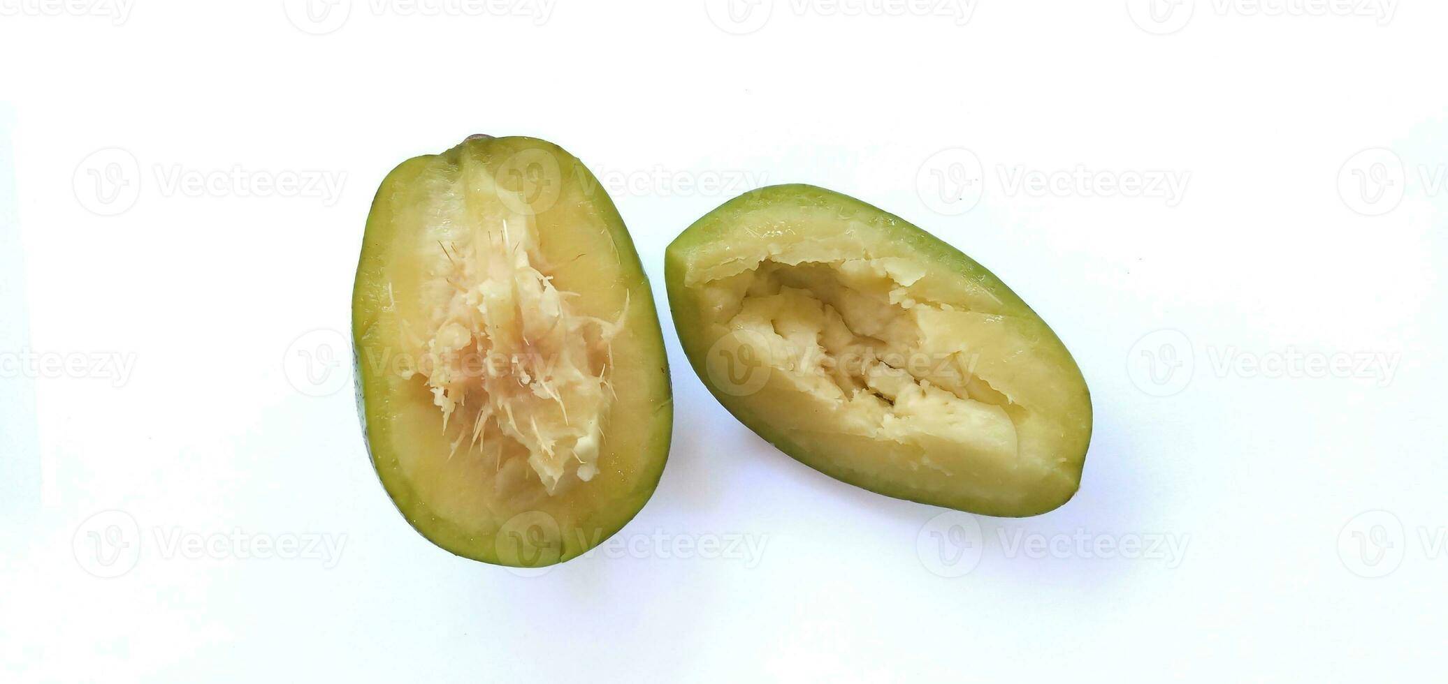 Kedondong also known as ambarella fruit or otaheite apple great hot plum fruit isolated on a white background. Scientific name is Spondias dulcis.Clipping path. photo