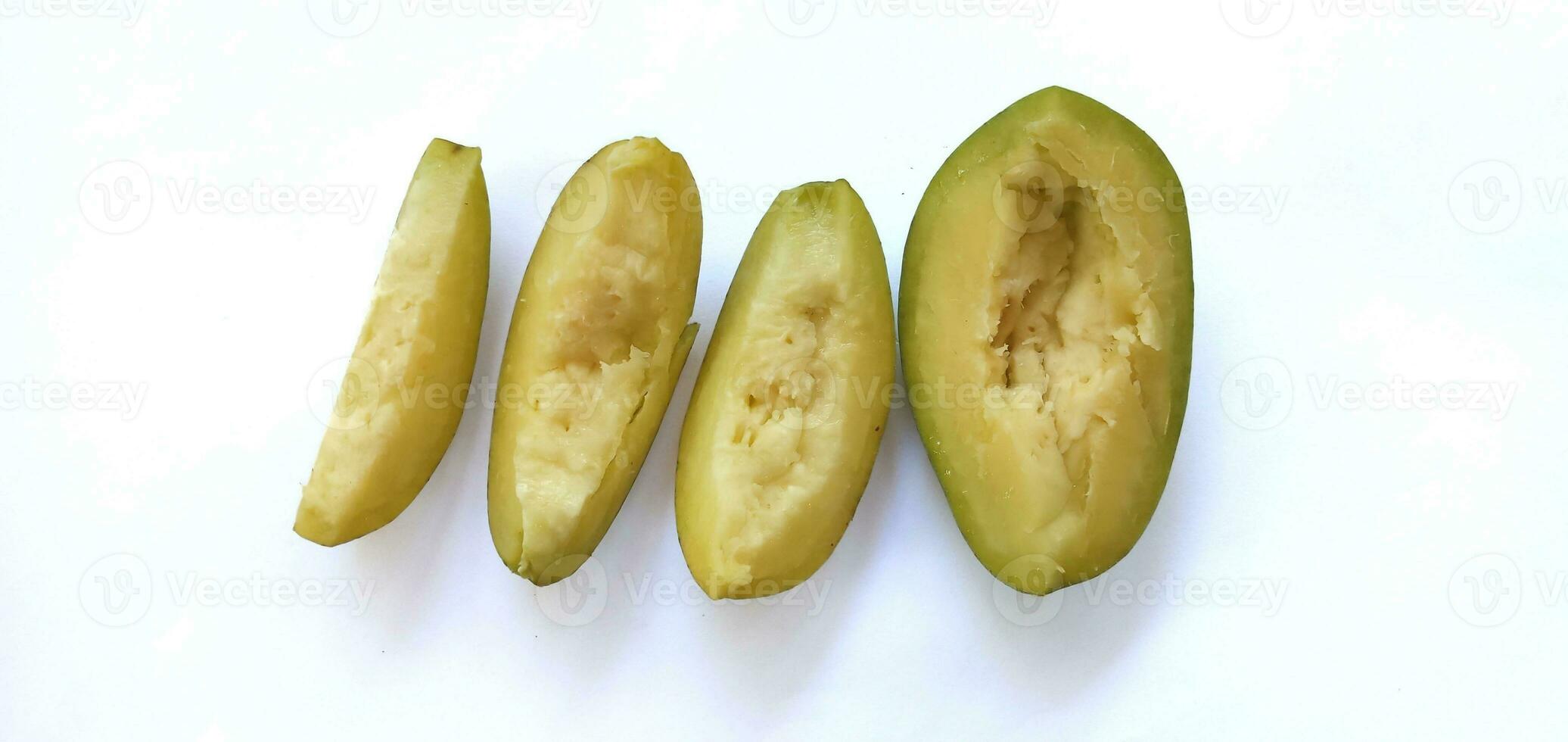 Kedondong also known as ambarella fruit or otaheite apple great hot plum fruit isolated on a white background. Scientific name is Spondias dulcis.Clipping path. photo