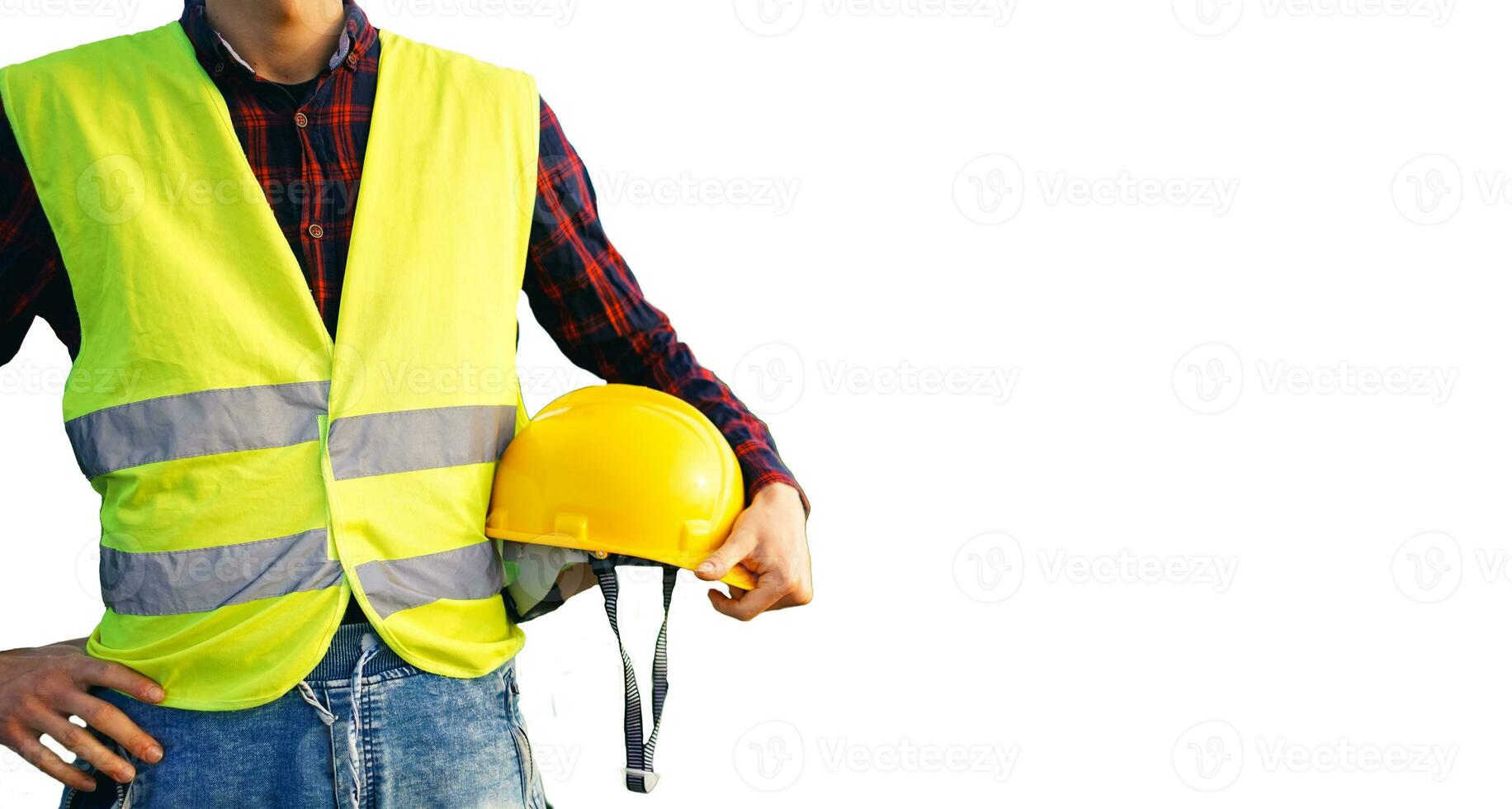 Construction worker holding yellow helmet. Building worker wearing fluorescent waistcoat. Isolated. photo
