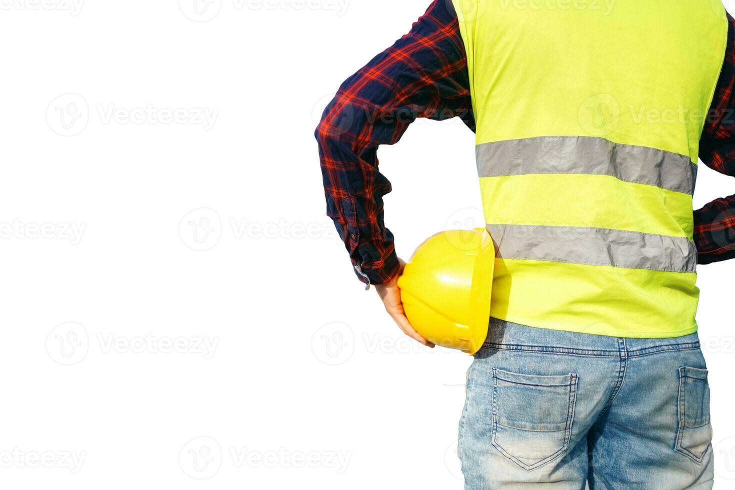 Construction worker holding yellow helmet. Building worker wearing fluorescent waistcoat. Isolated. photo