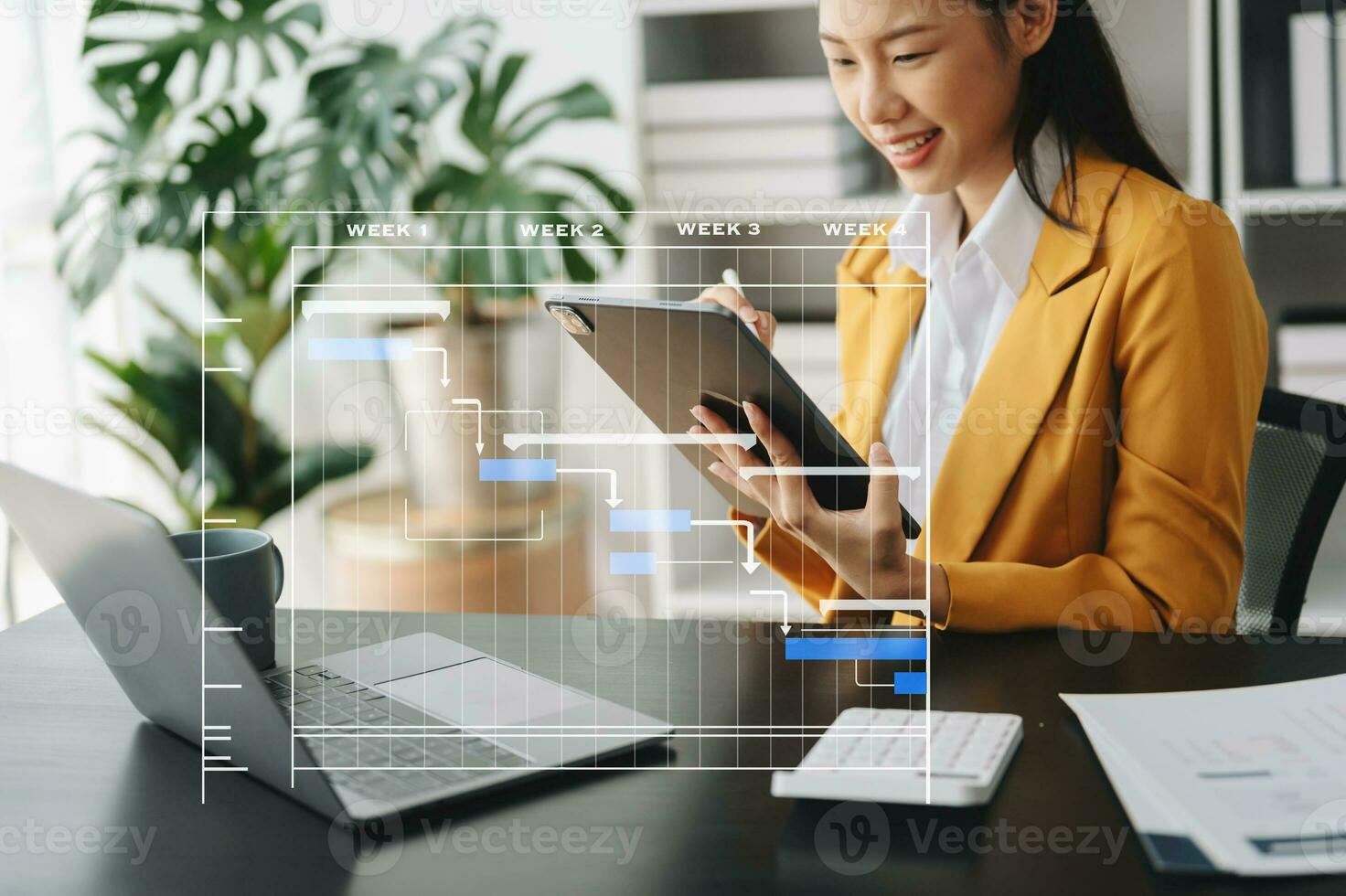 Project manager working and update tasks with milestones progress planning and Gantt chart scheduling diagram. business working with smart phone, tablet and laptop photo