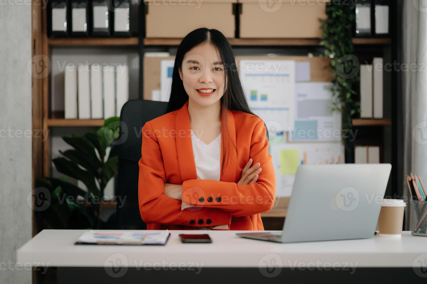 Business woman using tablet and laptop for doing math finance on an office desk, tax, report, accounting, statistics, and analytical research concept photo