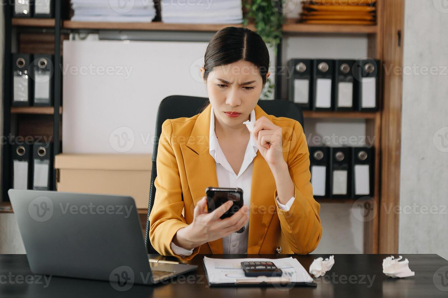 Business woman using tablet and laptop for doing math finance on an office desk, tax, report, accounting, statistics, and analytical research concept in office photo