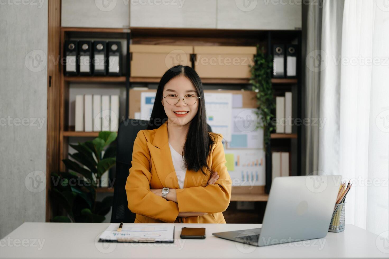 Business woman using tablet and laptop for doing math finance on an office desk, tax, report, accounting, statistics, and analytical research concept photo