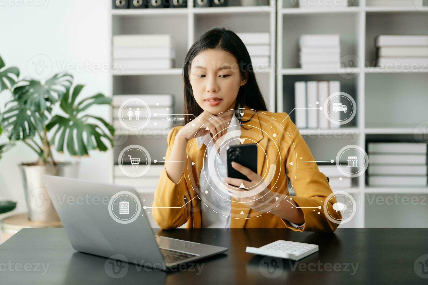 Woman Hand using tablet ,laptop, and holding mobile phone with credit card online banking payment communication network, internet application virtual icon photo