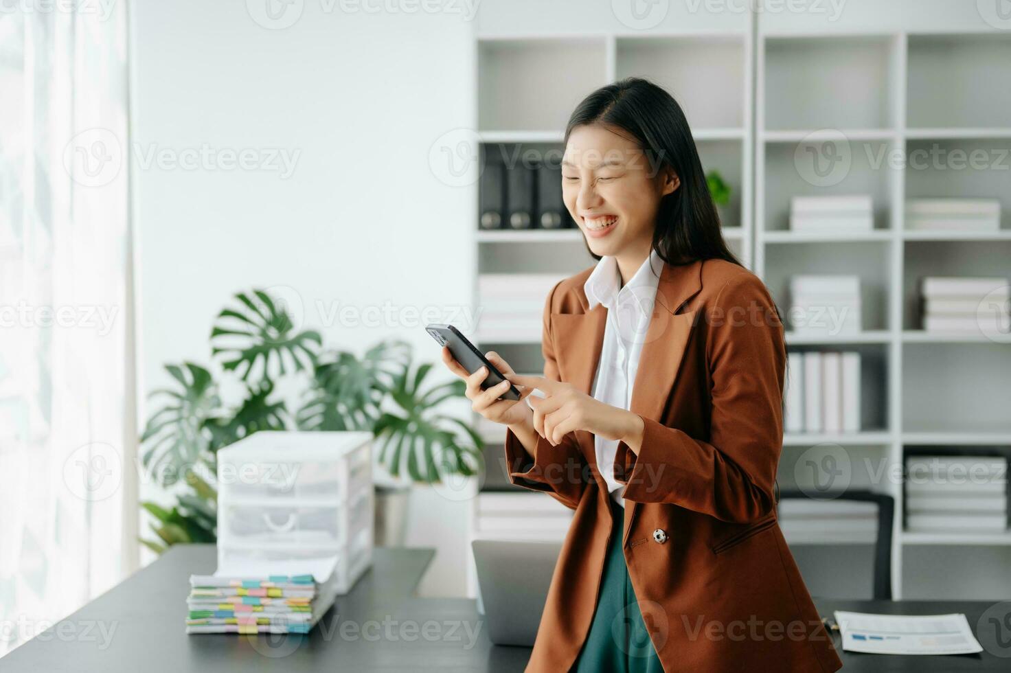 Business woman using tablet and laptop for doing math finance on an office desk, tax, report, accounting, statistics, and analytical research concept in office photo