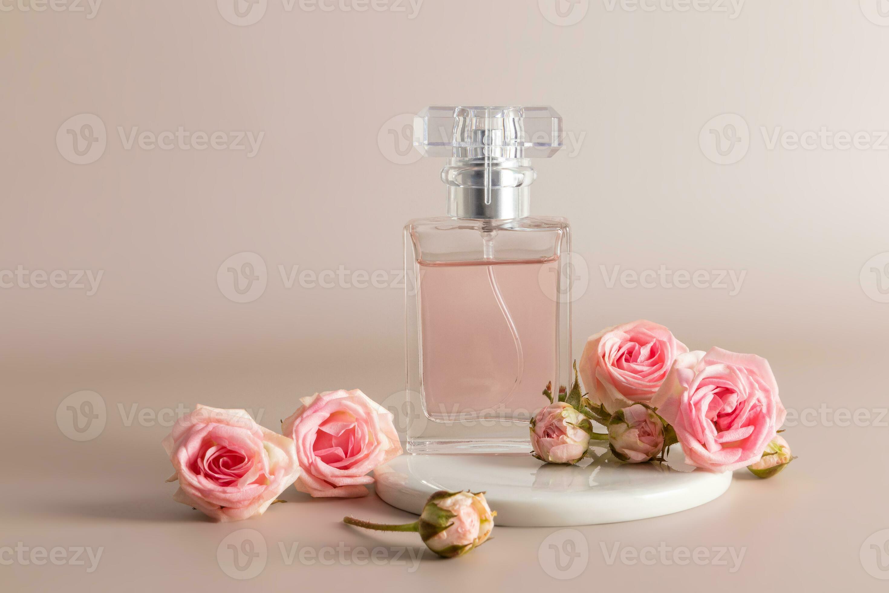 Beautiful cosmetic perfume bottle on a white round catwalk with small