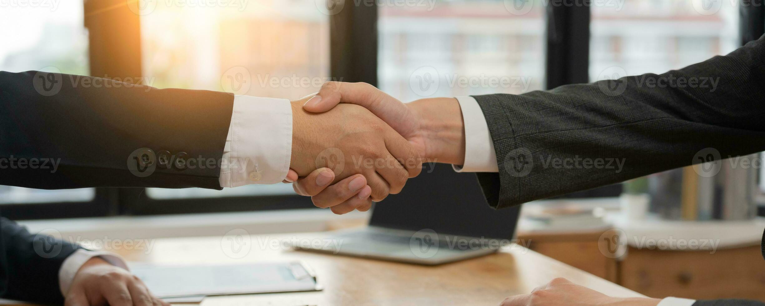 Executives are shaking hand after results success to target. financial data analysis and market growth report chart. Planning Strategies, startup project, profitable strategy, Business meeting time photo