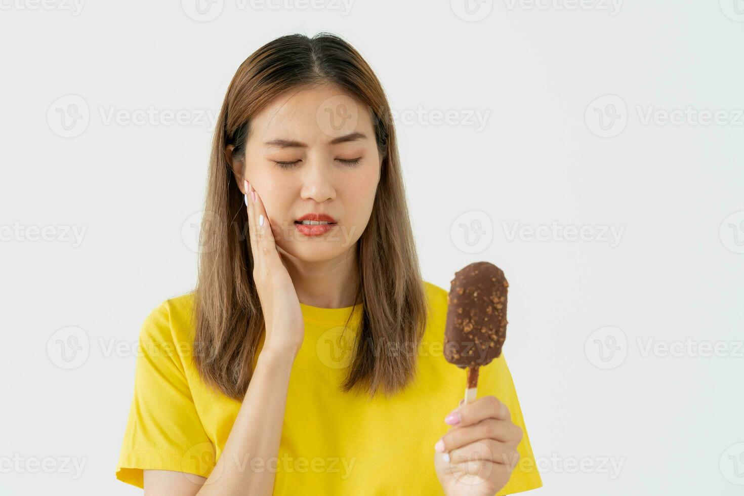 Asian woman feel sensitive teeth after eating ice cream, female suffer tooth, decay problems, dental care, tooth extraction, decay problem, bad breath, Gingival Recession, Oral Hygiene instruction photo