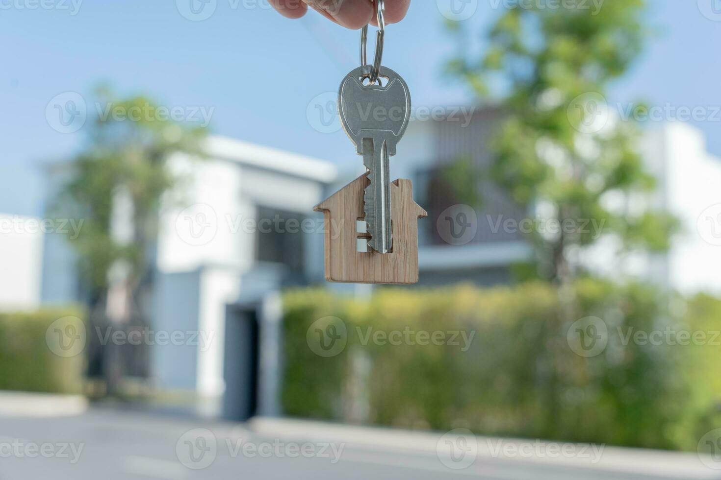 lease, rental and selling home. Real estate agent manager smile holding key for new owner.  rent house, Sales, loan credit financial, insurance, Seller, dealer, installment,  buy, sell, move in photo