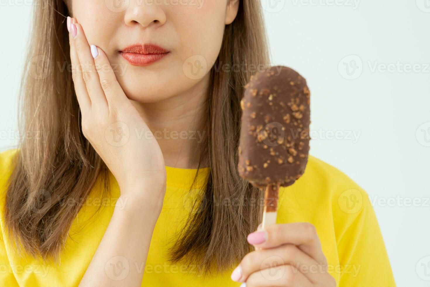 Asian woman feel sensitive teeth after eating ice cream, female suffer tooth, decay problems, dental care, tooth extraction, decay problem, bad breath, Gingival Recession, Oral Hygiene instruction photo