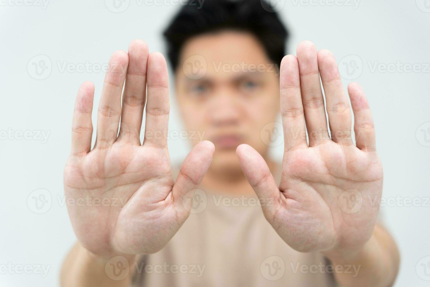 hand showing stop, insult. Pressure, sexism. Racism, stop violence expression with negative, stop taboo sign, rejecting, declining something, campaign against violence against women and children. photo