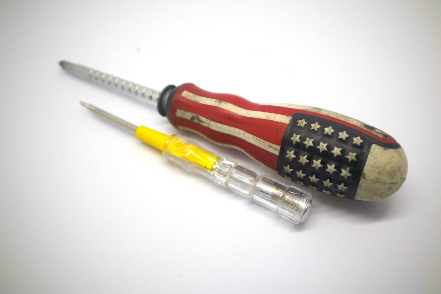 small screwdriver and large screwdriver isolate white background photo