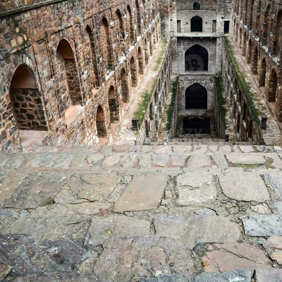 Agrasen Ki Baoli - Step Well situated in the middle of Connaught placed New Delhi India, Old Ancient archaeology Construction photo