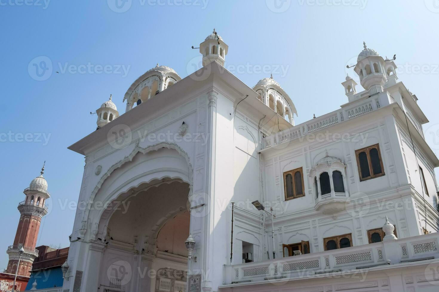 View of details of architecture inside Golden Temple - Harmandir Sahib in Amritsar, Punjab, India, Famous indian sikh landmark, Golden Temple, the main sanctuary of Sikhs in Amritsar, India photo