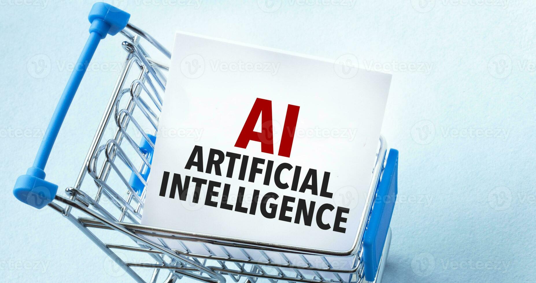 Shopping cart and text AI - Artificial Intelligence on white paper note list. Shopping list concept on blue background. photo