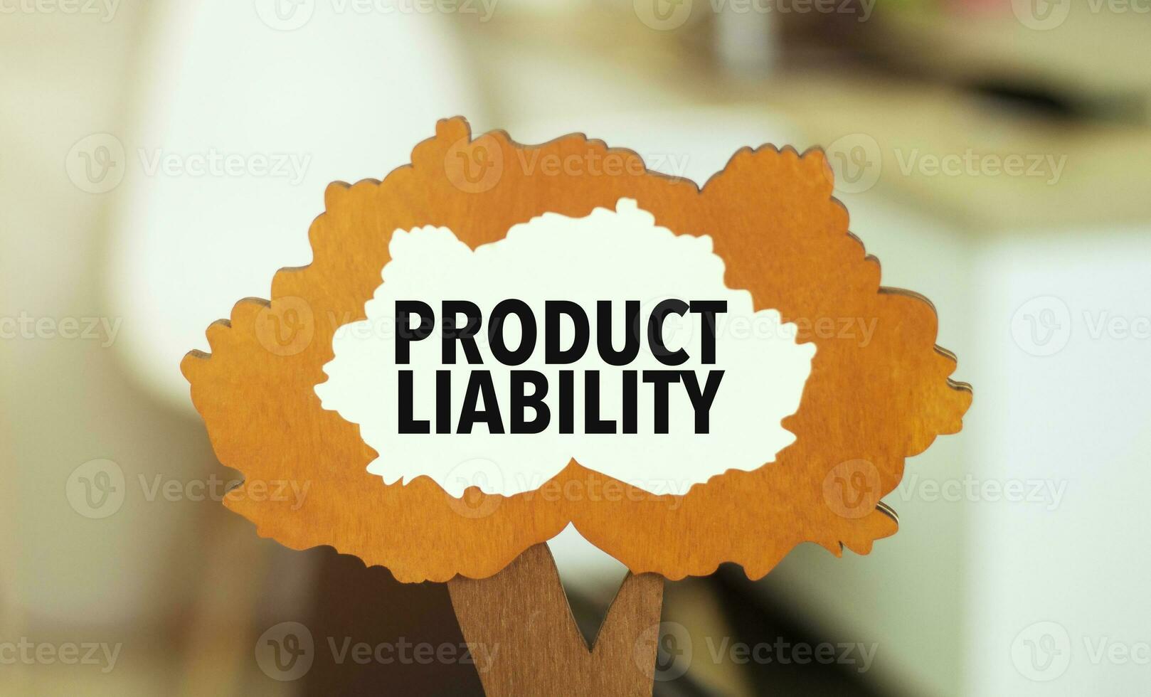 figure of a tree with text product liability inside the foliage. Business concept photo