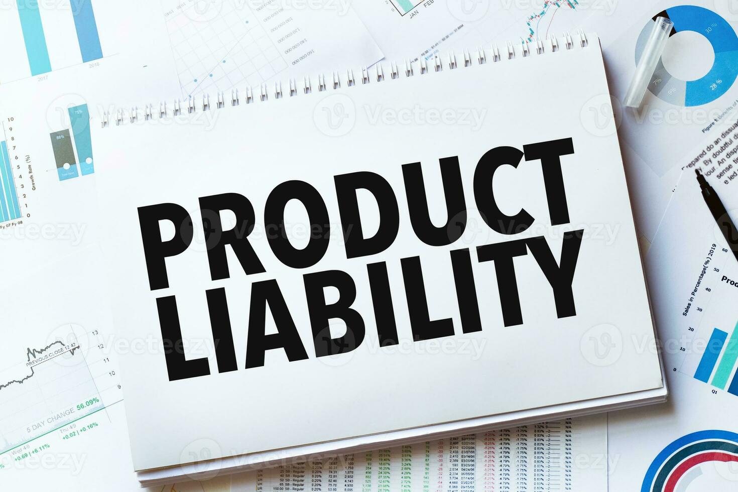 Notebook with Tools and Notes with text product liability photo