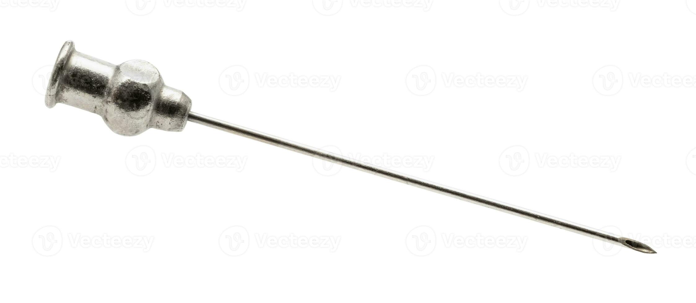 vintage steel hypodermic needle isolated on white photo