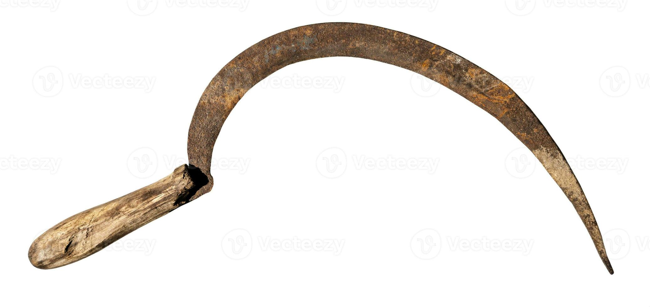 ancient rusty forged iron sickle with wood handle photo