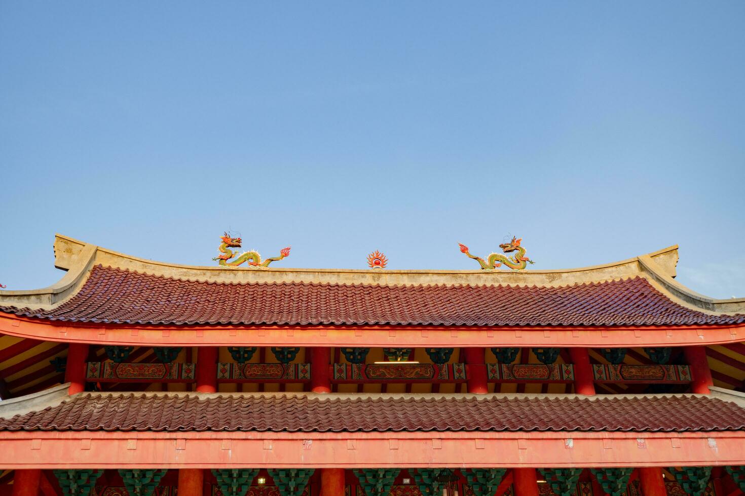 Chinese temple with guardian statue when Chinese new year celebration. The photo is suitable to use for Chinese new year, lunar new year background and content media.