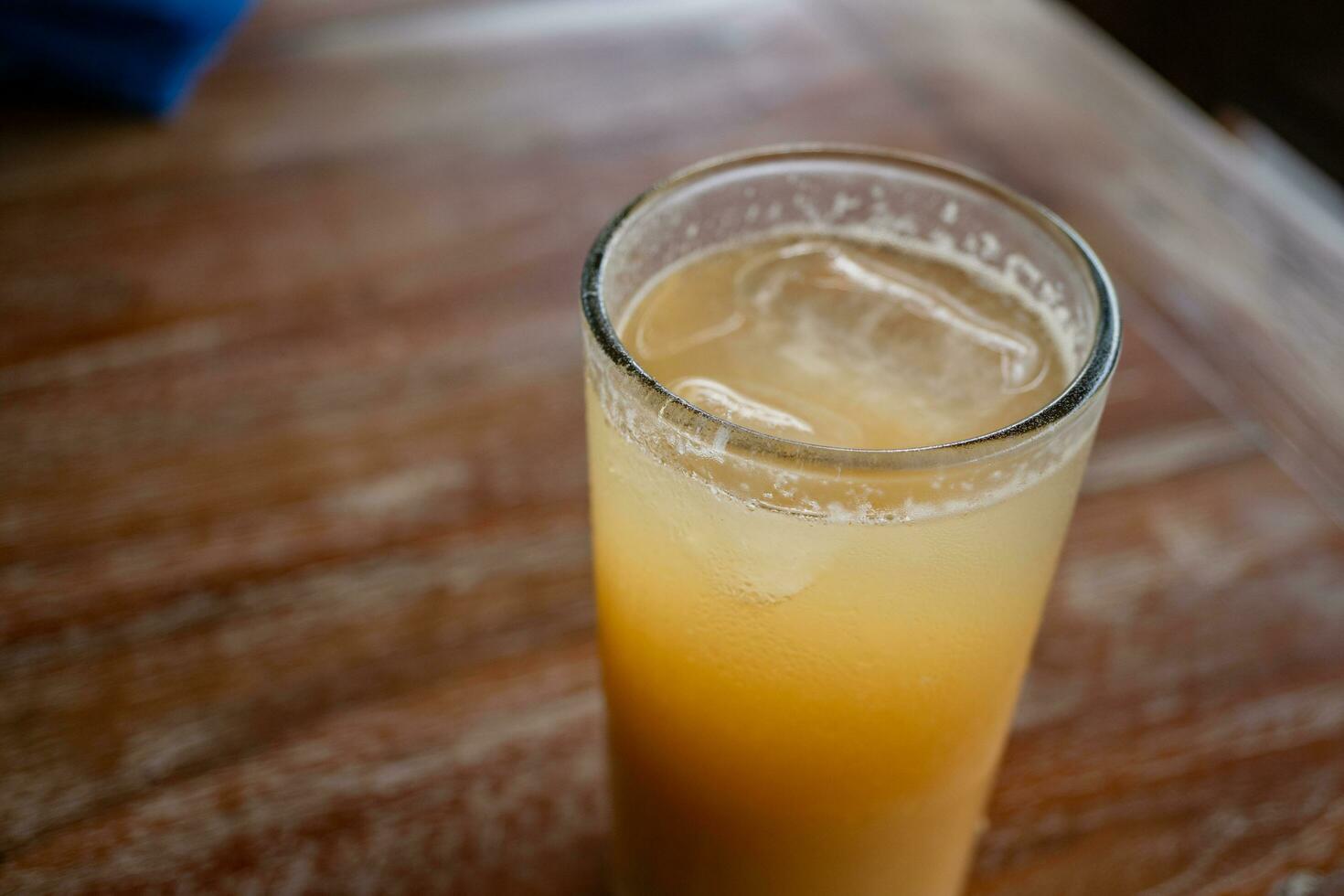 Traditional drink of Indonesia Jamu Beras Kencur Iced, fresh and tasty. The photo is suitable to use for drink background, menu poster and content media.