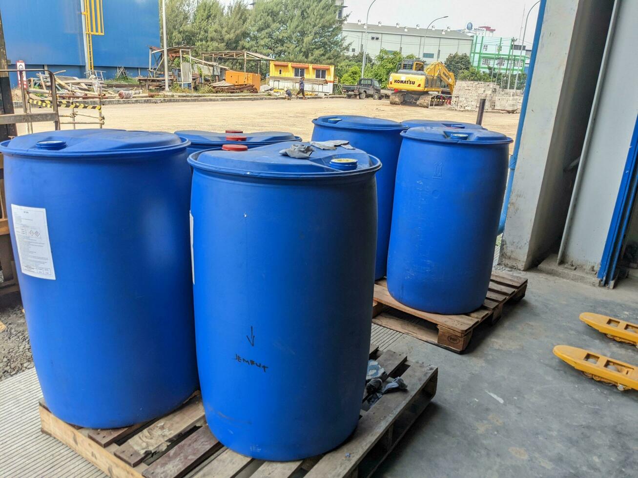 Blue drum for chemical storage on power plant process. The photo is suitable to use for industry background photography, power plant poster and electricity content media.