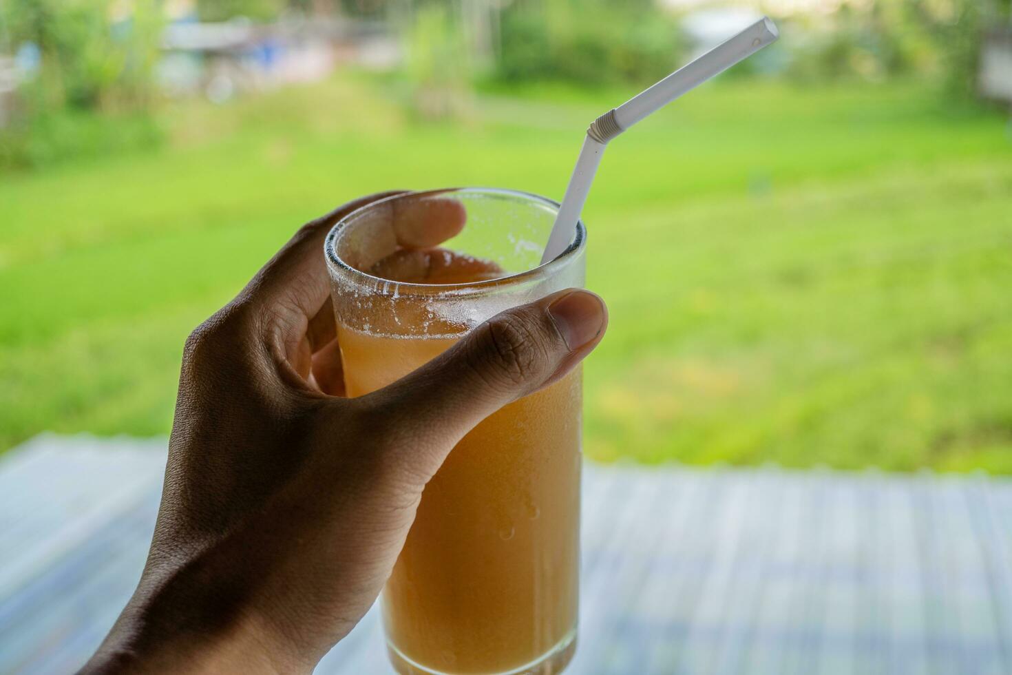 Traditional drink of Indonesia Jamu Beras Kencur Iced, fresh and tasty. The photo is suitable to use for drink background, menu poster and content media.