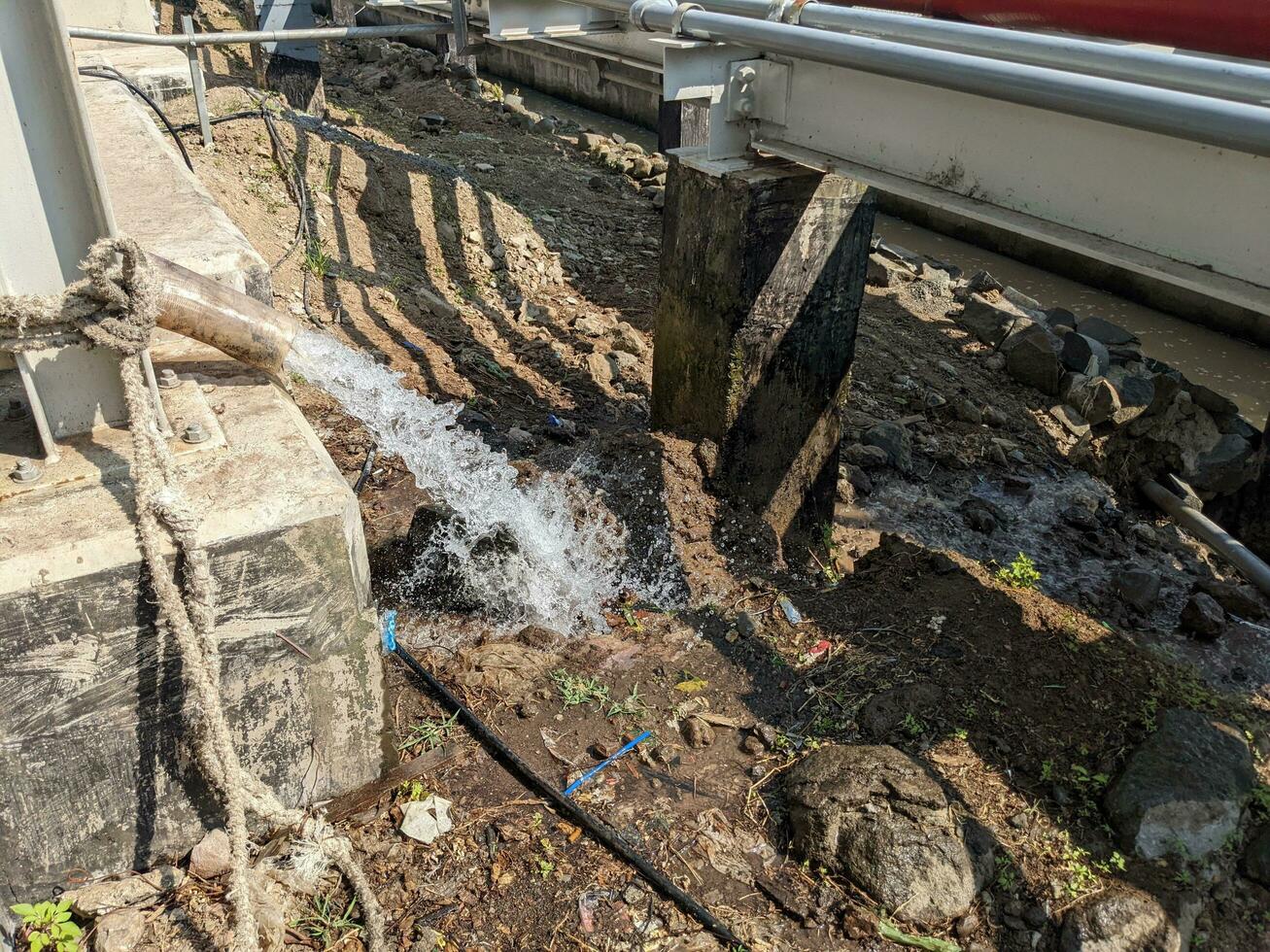 Water dumping to the waste water pond on the water treatment area. The photo is suitable to use for industrial background and construction content media.