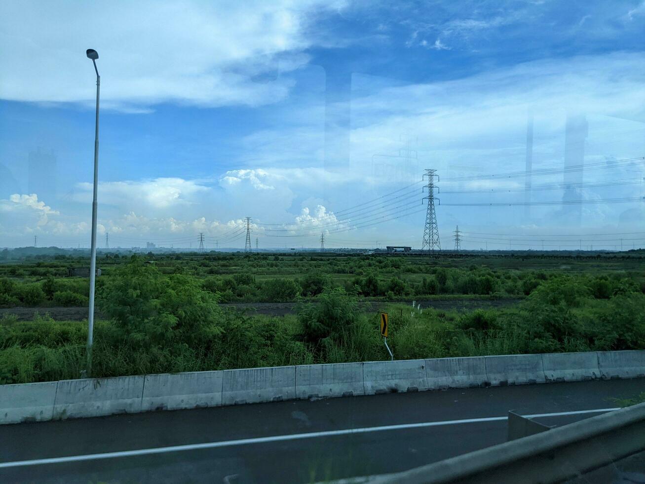 Landscape scenery journey of hill, mountain and industry plant. The photo is suitable to use for adventure content media, nature poster and forest background.