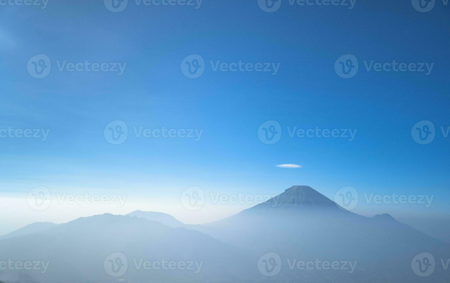 Landscape mountain when morning time sunlight summer vibes. The photo is suitable to use for adventure content media, nature poster and forest background.