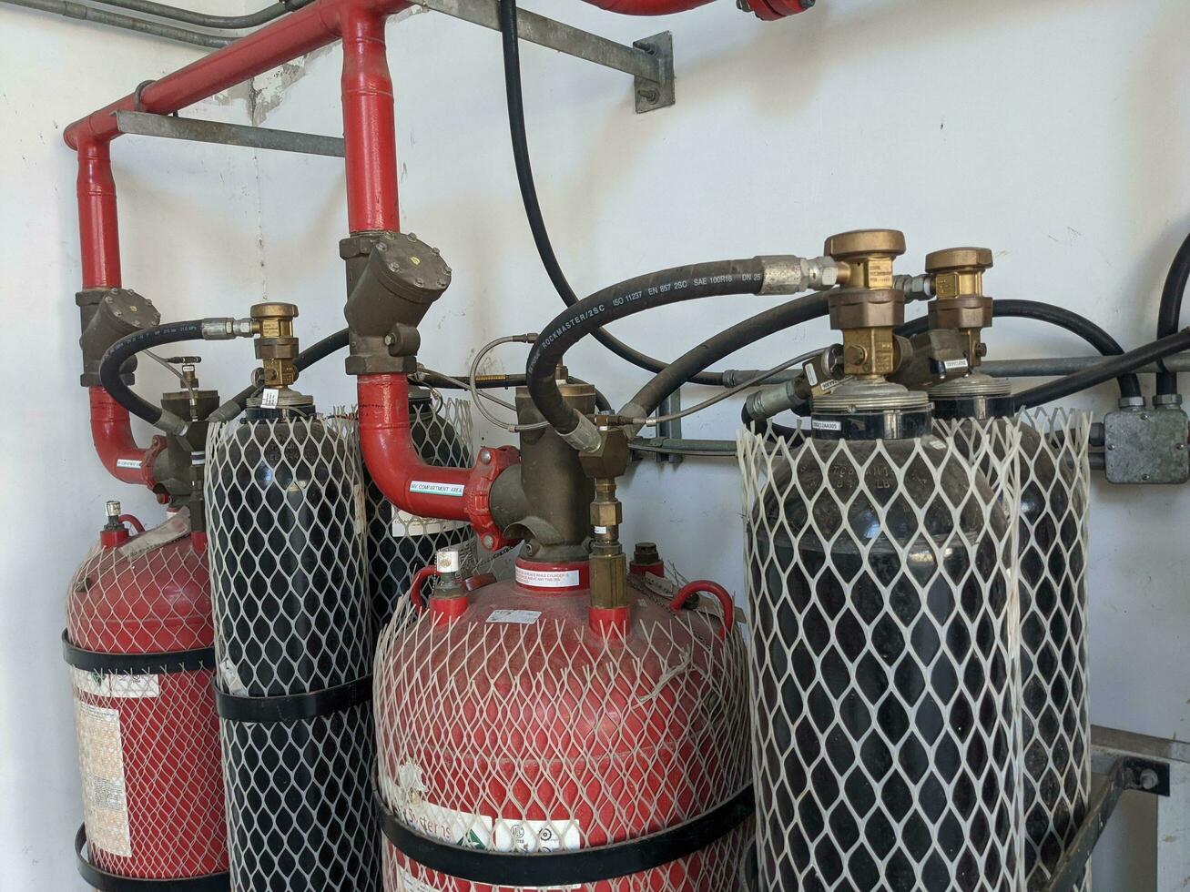 Gas fire protection cylinder on the admin building. The photo is suitable to use for safety content media and fire protection background.