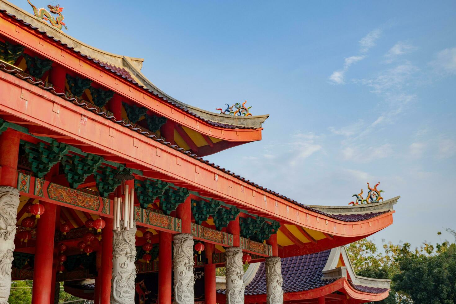 Chinese temple with guardian statue when Chinese new year celebration. The photo is suitable to use for Chinese new year, lunar new year background and content media.